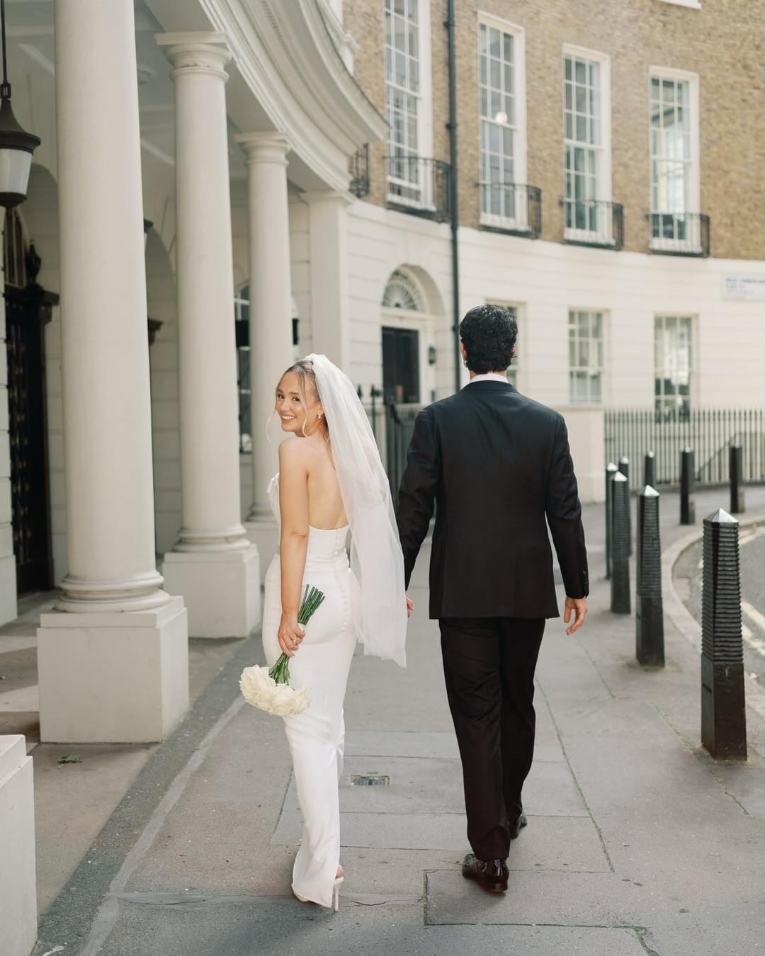 London, exactly as they imagined it.S&O knew what they wanted from their wedding day; black tie, timeless style, a little old-world glamour and that unmistakable London energy.Old Marylebone Town Hall, quiet mews, white roses, champagne, flash, grain and a city that gave us the most beautiful backdrop. Editorial when it called for it, completely unguarded when it mattered.Elegant, iconic and very, very them. What a day 🤍Ceremony @adaytorememberlondon
Content @bridediariesuk
Florals @blommelondon
Makeup @beautybyellieparkhurst
Hair @chantellesmithmua
Ceremony Dress @carolinecastigliano
Veil @charlottemillsshoes
Earrings @libertyinlove_style
Bridesmaids @azazie.uk
Suits @suitsupply
Hotel @the_landmark_london
Reception @greyhoundmarylebone
Bride @shannonstinton_
Groom @obstintonOld Marylebone Town Hall wedding photography with a modern editorial feel, combining natural moments, timeless portraits and the character of a London wedding.