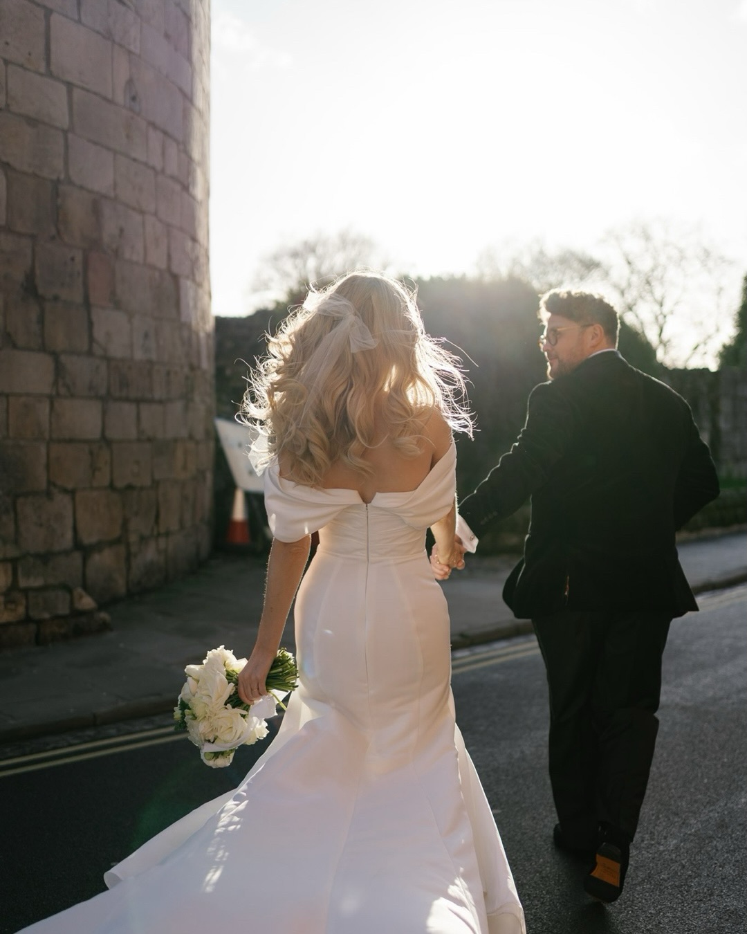 Black tie, winter sunshine and the beautiful streets of York.

From getting ready at No.1 Guesthouse York; confetti outside York Register Office and an intimate celebration at the Pearly Cow. A city wedding full of lovely people, beautiful details and all the gorgeous moments in between.

Exactly my kind of day 🥂

Bride @haguey27 
Groom @craigo_mt 
Venue @pearlycowyork @guesthousehotels 
Ceremony @yorkregisteroffice 
Dress @marytrufel_dubai 
Suit @suitsupply 
Hair & Makeup @sonia.rosa.mua
Florals @thewildarrangement 
Shoes @manoloblahnik
Bag @prada

Editorial York wedding photography | Intimate city weddings | York Register Office wedding | Pearly Cow York wedding reception | No. 1 York by GuestHouse | Natural, relaxed and timeless wedding photography in Yorkshire.

#editorialweddingphotographer #townhallwedding #blacktiewedding  #yorkshireweddingphotographer