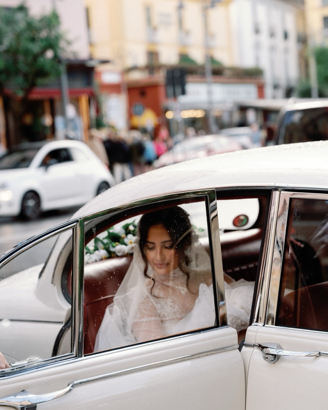 An Italian romance, with a little unexpected drama…Three days of torrential rain, sweeping storm clouds and a Sorrento quite unlike the one we know and love.An elegant church ceremony, beautifully cinematic portraits against the moody Amalfi coastline, and an intimate, candlelit celebration at Villa Angelina, where exquisite florals, Champagne and the warmth of everyone gathered made the weather feel a world away.Not quite the Italian sunshine they had imagined, but every bit as magical.Alessia & Francesco | Villa Angelina, Sorrento, ItalyWedding Planner @haloeventi
Coordinated by @simonaimparatoevents
Venue @villaangelinaofficial
Dress @lesposedigio
Florals @francescoliberato_florist @mary_leonessa_flowerdesign
Makeup @mdamariadambro
Hair @teamleohair_caravaggio  Cake @laqua.countryside
Stationery @vittoriocaselli
Caterer @laqua.countryside
Drinks @baring.barcatering Videographer @diegoperrinivideo
Shoes @aminamuaddiofficial
Music @starartistproject
Violinist @felicedamico Furniture @allestimentilerose
Lighting & Sound @studioprojectsrl
Groom’s Suit - Antonio Di Melfi
Bride @alessiaassisi
Groom @francescomm28#sorrentoweddingphotographer #italyweddingphotographer #amalficoastweddingphotographer #luxuryweddingphotographer #editorialweddingphotographerLuxury destination wedding photography, Villa Angelina wedding, Sorrento wedding photographer, Amalfi Coast luxury weddings, cinematic wedding photography in Italy, editorial destination wedding photographer, romantic Italian wedding, luxury European wedding photographer